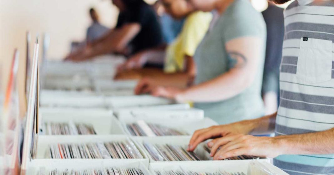 People searching through records to buy